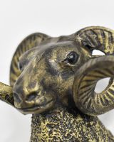 Close up of intricate face detail on Black & Gold Ram Wall Bust