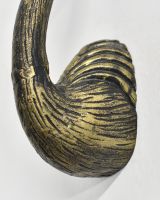 Close up of body detail on flamingo head animal wall bust