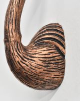 Close up of body detail on flamingo wall bust