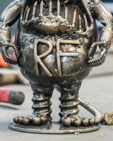 Close up of body detail on scrap metal sculpture Close up of body detail on scrap metal sculpture