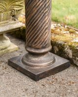 Close up of intricate detail on garden plinth
