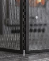 Close up of connections on triple fold black fire guard Close up of connections on triple fold black fire guard