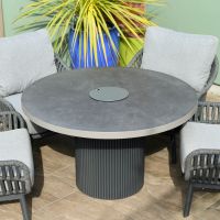 Close up of four seater table and chairs set with ice bucket detail 