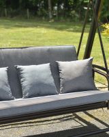 Close up of cushions on oudoor bench seat