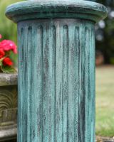 Close up of verdigris finish on garden plinth Close up of verdigris finish on garden plinth