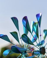 Close up of colourful petal edge detail on iridescent windspinner