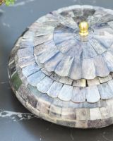 Close up of intricate scalloped edge detail on trinket box