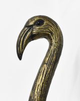 Close up of intricate face detail on flamingo wall bust