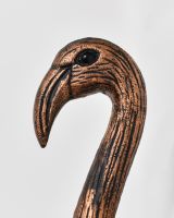 Close up of intricate face detail on copper animal wall bust