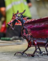 Close up of face detail on recycled metal dragon sculpture