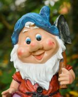 Close up of intricate face detail on intricate garden gnome ornament Close up of intricate face detail on intricate garden gnome ornament