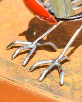 Close up of feet detail on robin sculpture