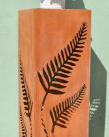 Close up of intricate detail on rustic garden column