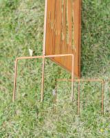 Close up of ground spikes on Rustic Bamboo Decorative Garden Screen Close up of ground spikes on Rustic Bamboo Decorative Garden Screen