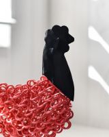 Close up of head detail in recycled cockerel sculpture