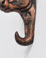 Close up of sturdy hook detail on copper detail animal bust coat hook Close up of sturdy hook detail on copper detail animal bust coat hook