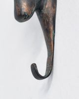 Close up of sturdy hook detail on animal bust coat hook Close up of sturdy hook detail on animal bust coat hook