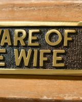 Close up Of Be Aware of the wife - Gate sign