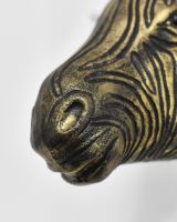 Close up of muzzle detail on gold animal wall bust