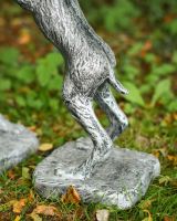 Close up of hind legs on Pewter Boxing Hares Sculpture Close up of hind legs on Pewter Boxing Hares Sculpture