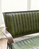 Close up of intricate backrest detail on two seater leather chair