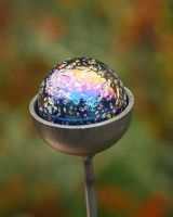 Close up of marble detail on suncatcher plant pot stake