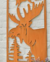 Close up of intricate moose detail on rustic garden art Close up of intricate moose detail on rustic garden art