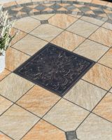 close up of mosaic table top detail on garden dining set