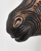 Close up of intricate muzzle detail on copper zebra wall bust