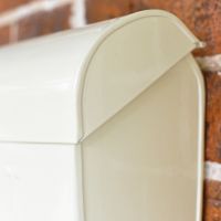 Close Up Of Opening Lid On Cream Modern Wall Post Box
