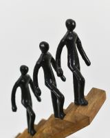 Close up of the people on the home decor ornament Close up of the people on the home decor ornament