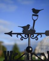 Close up of robin detail on weathervane