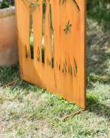 Close up of intricate cut out detail on freestading garden screen Close up of intricate cut out detail on freestading garden screen