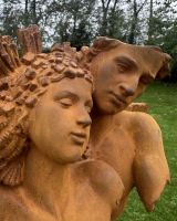 Close up of intricate detail on rustic cast iron garden sculpture Close up of intricate detail on rustic cast iron garden sculpture