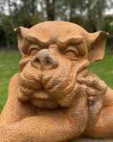 Close up of intricate detail on rustic finish gothic gargoyle sculpture