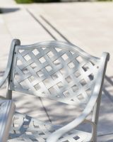 close up detail of chair lattice on blanche garden set