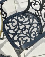 Close up of intricate seat detailing on patio two seater dining set