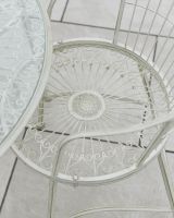 Close up of intricate seat detail on four seater outdoor furniture set Close up of intricate seat detail on four seater outdoor furniture set