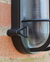 Detailed close up of nautical bulkhead wall light 