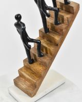 close up of mango wood stair detail on interior sculpture close up of mango wood stair detail on interior sculpture