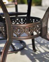 close up of base detail on 4 seater garden table and chairs set