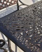 Close up of table top detail on aluminium dining table