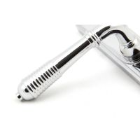 Close up of the Handle of the Reeded Slimline Lever Espagnolette Door Latch in Polished Chrome