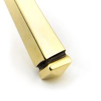 Close up of the Handle for The Tapered Slimline Lever Espagnolette Door Latch in Aged Brass Close up of the Handle for The Tapered Slimline Lever Espagnolette Door Latch in Aged Brass