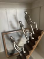 Close up of intricate detail on silver home decor ornament Close up of intricate detail on silver home decor ornament