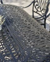 Aged Black Table Top On The "Moreville" Eight Seater Furniture Set