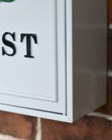 Close Up Of The White Finish On The Oxford Post Box