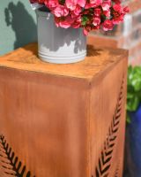Close up of top detail on rustic plant stand
