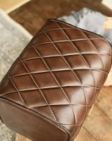 Close up of stitched leather detail on The "Yale" Mango Wood & Brown Leather Stool