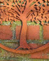 Close up of trunk detail on rustic garden wall art